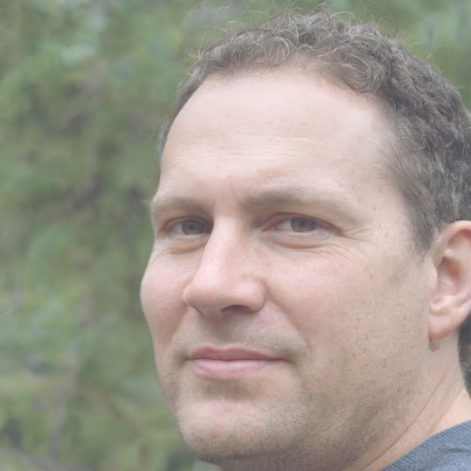 Professional headshot of Kieran Hollingsworth